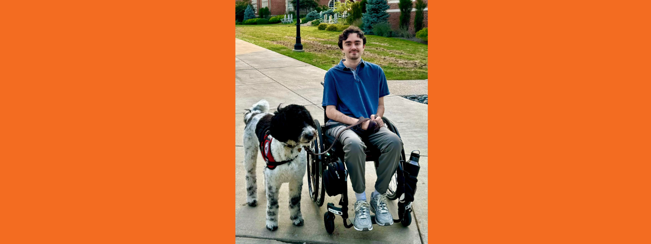 Steph with his service dog, Noel