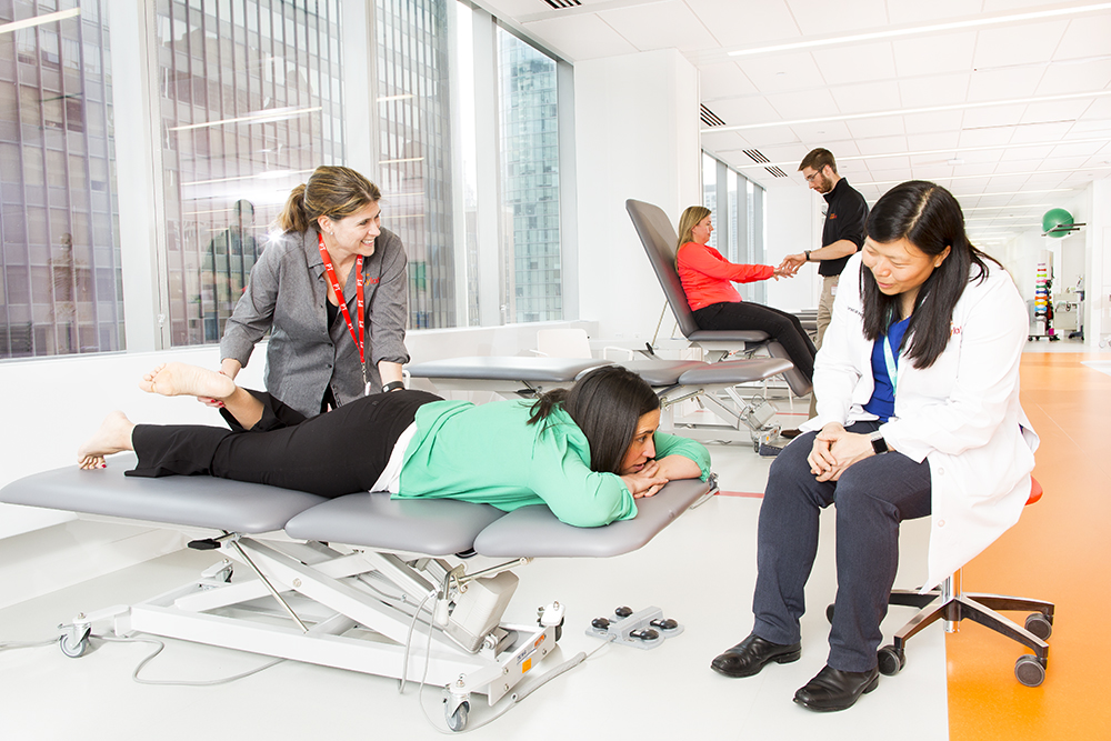 Dr. Rho with a patient