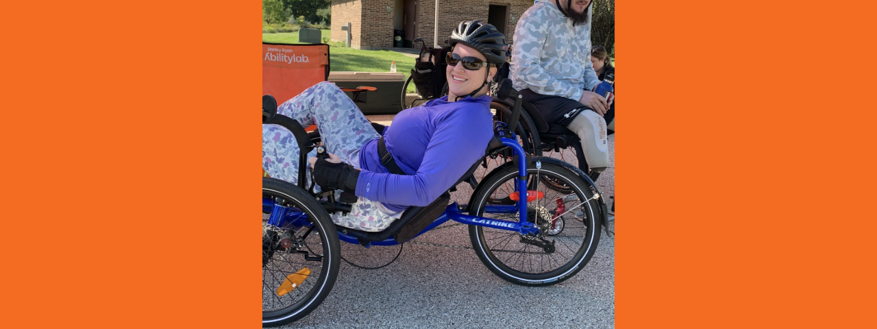 Molly riding a recumbent bike