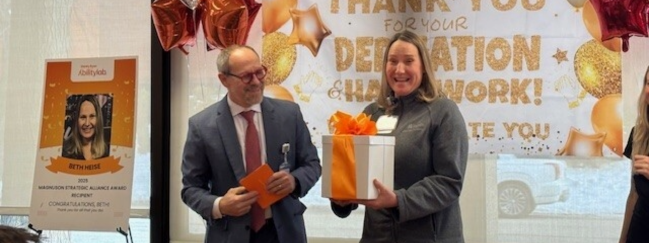 Beth receiving her award