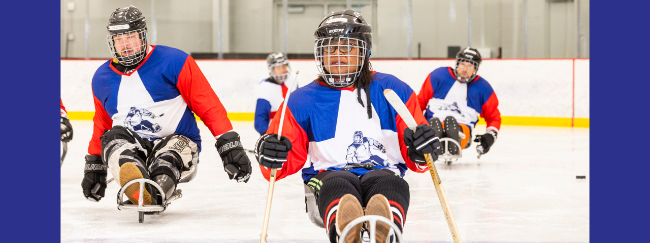 sled hockey player on the ice