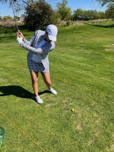 Cassandra golfing