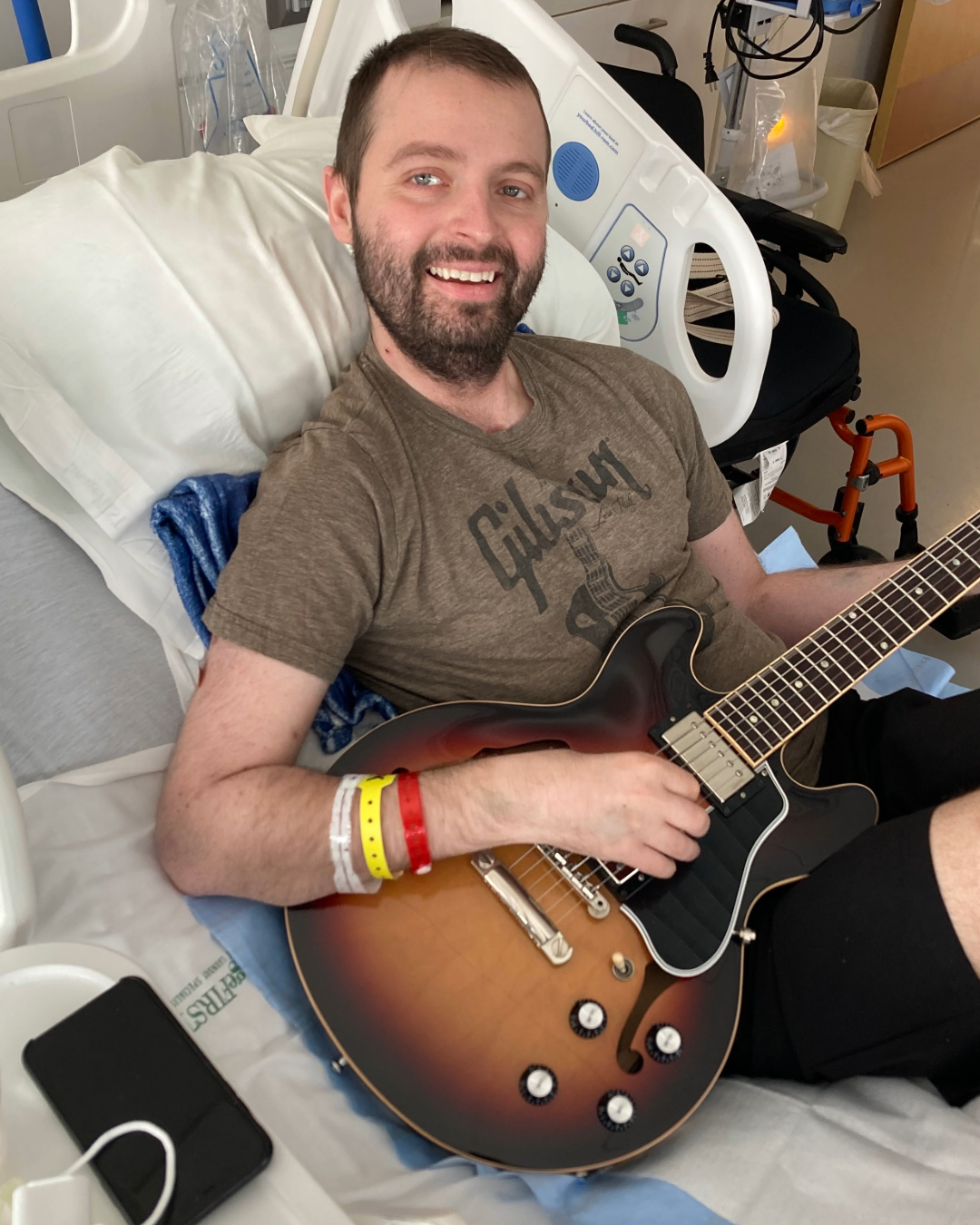 Dean playing guitar