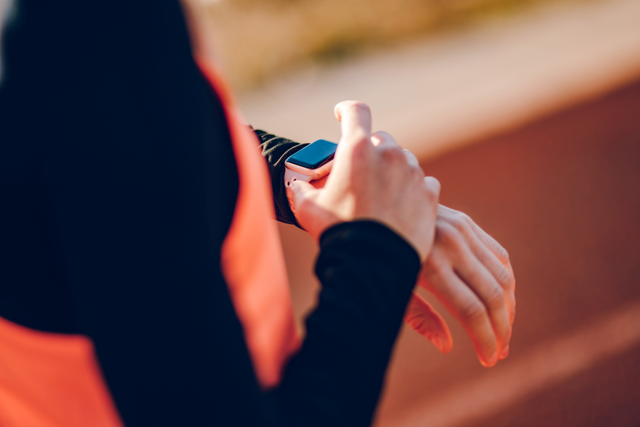 A person checking their smart watch