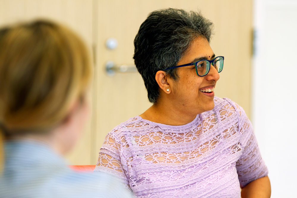 image of Sudha participating in the ICAP program, smiling 