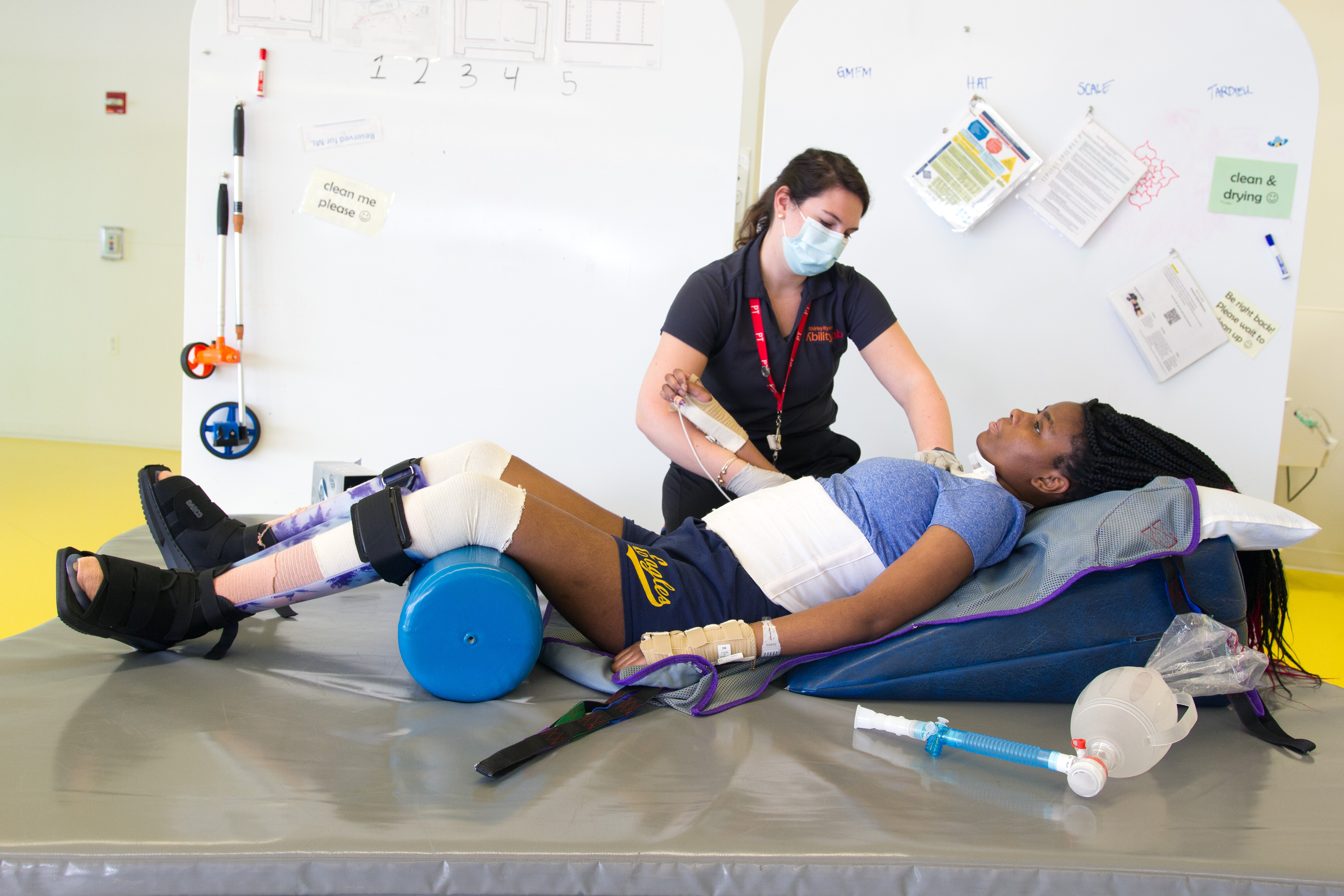 Clinician examining respiratory muscles