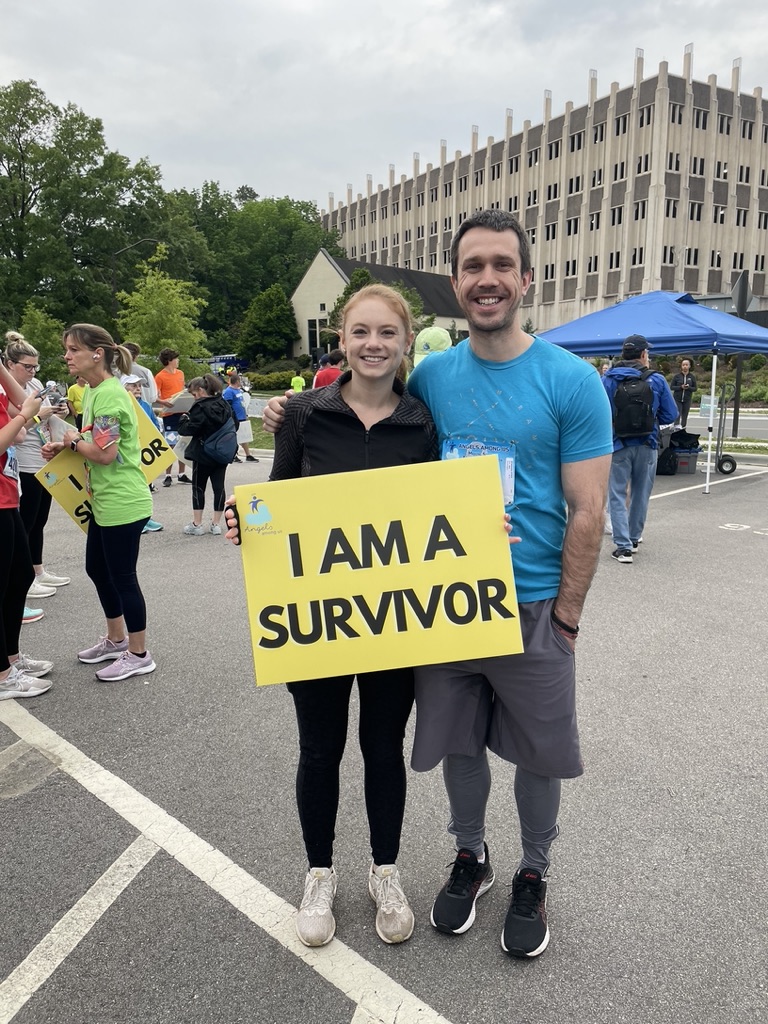 Nicole holding sign