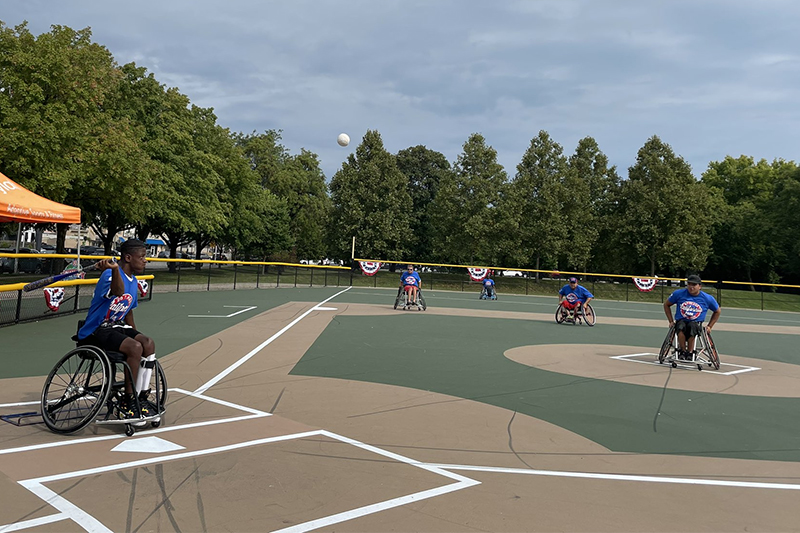 Wheelchair softball players enjoying the refurbished California Park field.