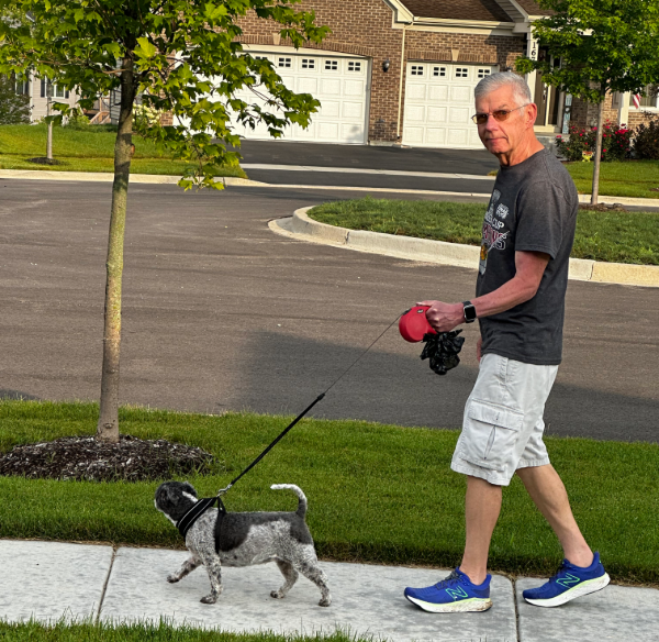 Doug holding leash