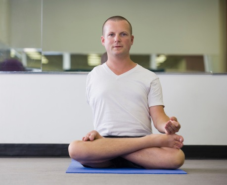 man doing yoga