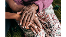 black people's hands clasping 