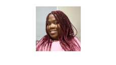 young black woman with pink top and pink braids, smiling