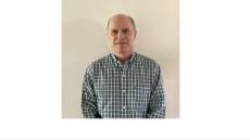 Color photo of Kevin Fearn, a middle aged white mad in a checkered shirt