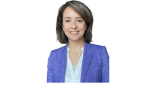 Photo of Sara Ahmed, a young white woman with short brown hair wearing a blue blazer
