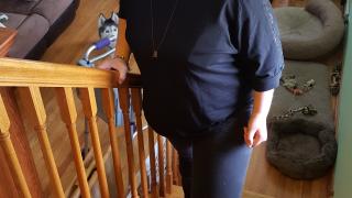 Courtney walking up stairs