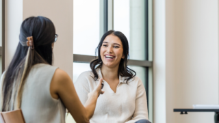 two women talking