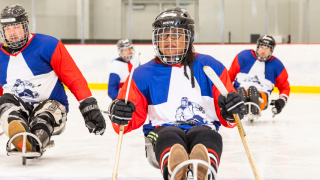 sled hockey player on the ice
