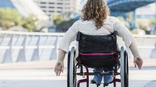 A spina bifida patient out for a stroll