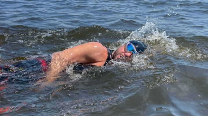 Rob Heitz swimming in Lake Michigan