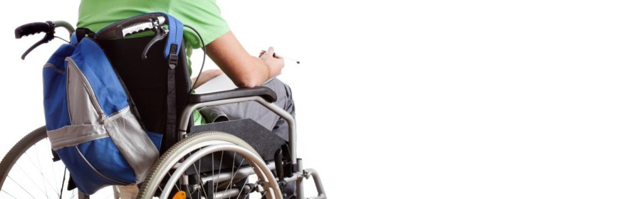 guy with green shirt, backpack in wheelchair