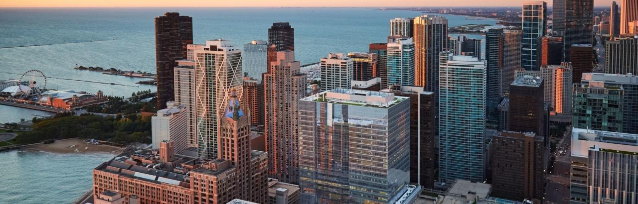 Shirley Ryan AbilityLab visible within the Chicago skyline during sunset.