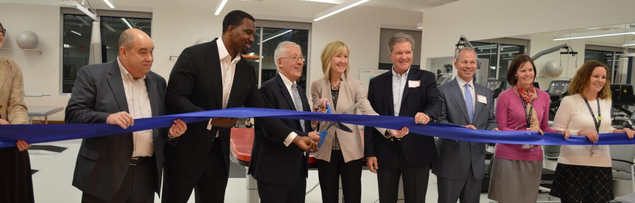 Joanne C. Smith, MD, president and CEO of Shirley Ryan AbilityLab,  Homewood Mayor Rich Hofeld and Illinois State Senator Napoleon B. Harris, and others cut the ribbon at the new Homewood DayRehab Center