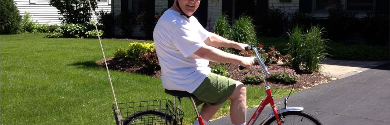 Walter Mason on a bike as he rejoins his community after stroke