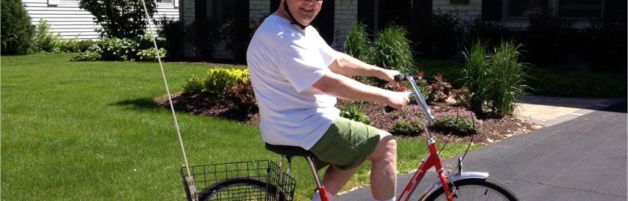 Walter Mason on a bike as he rejoins his community after stroke