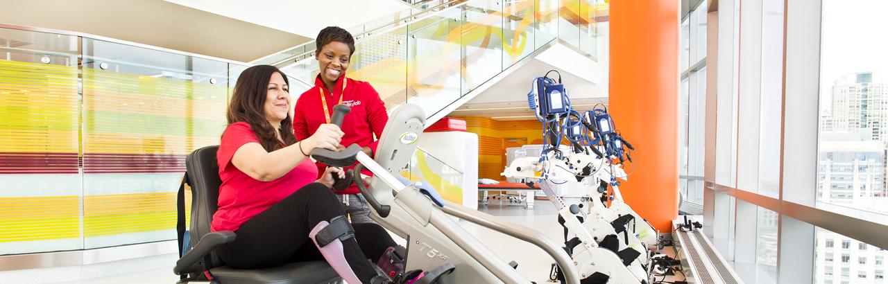 Patient and therapist work on bike training