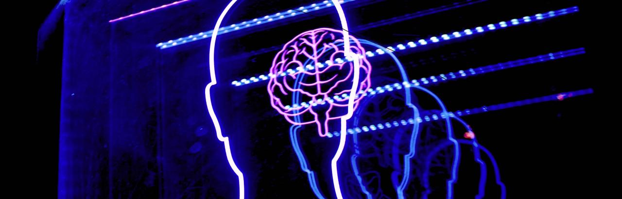 Neon silhouette of man w/ brain, repeating