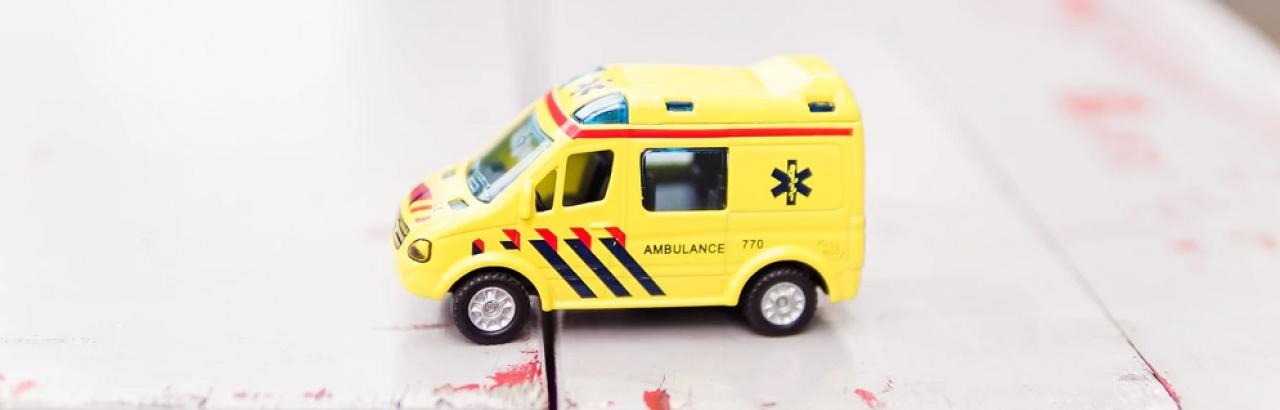yellow toy ambulance