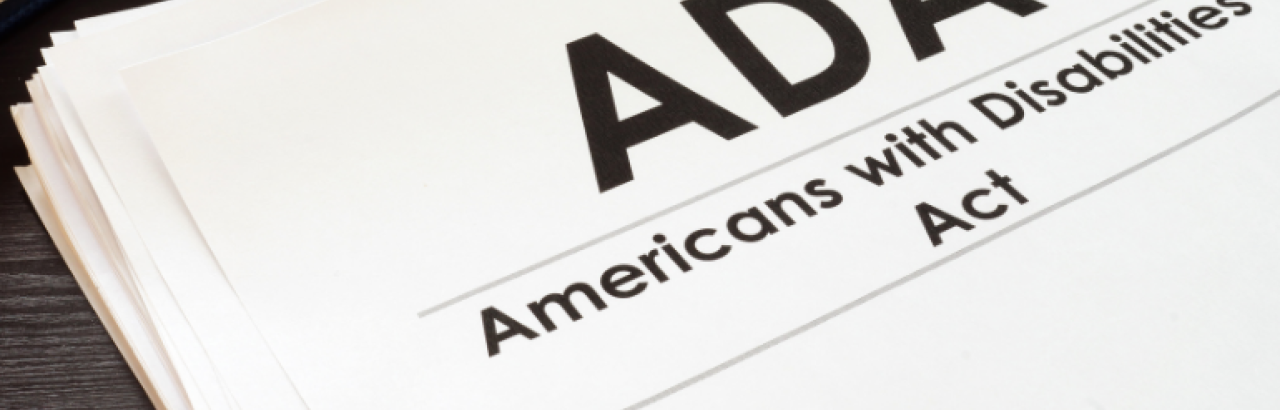 This image shows a picture of the 'American's with Disabilities Act' written on a sheet of paper.