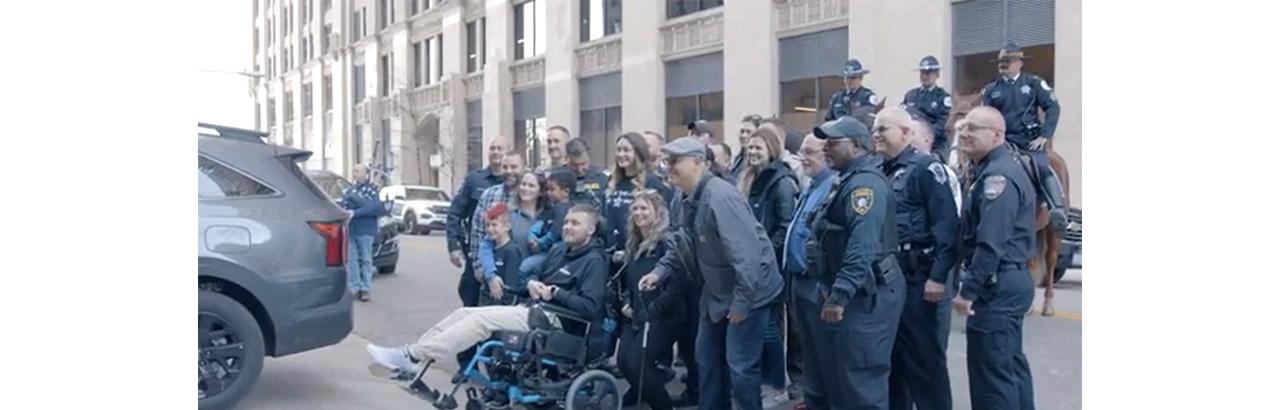 Officer Tyler Bailey’s poses for a photo with his well-wishers