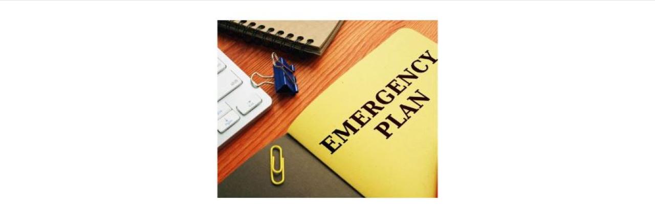 photo of folders on a desk. Yellow folder says Emergency Plan