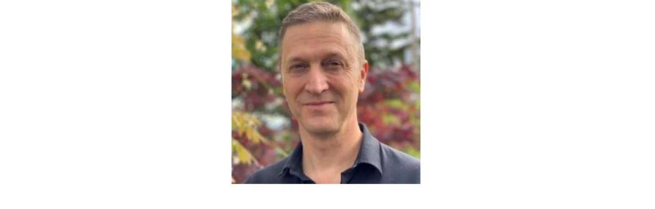 photo of Mark Harniss, a white, middle-aged man with short brown hair