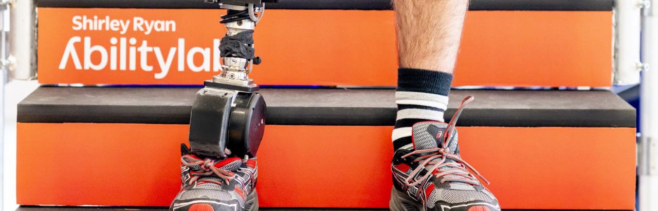Man standing with powered leg