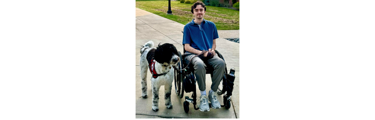 Steph with his service dog, Noel