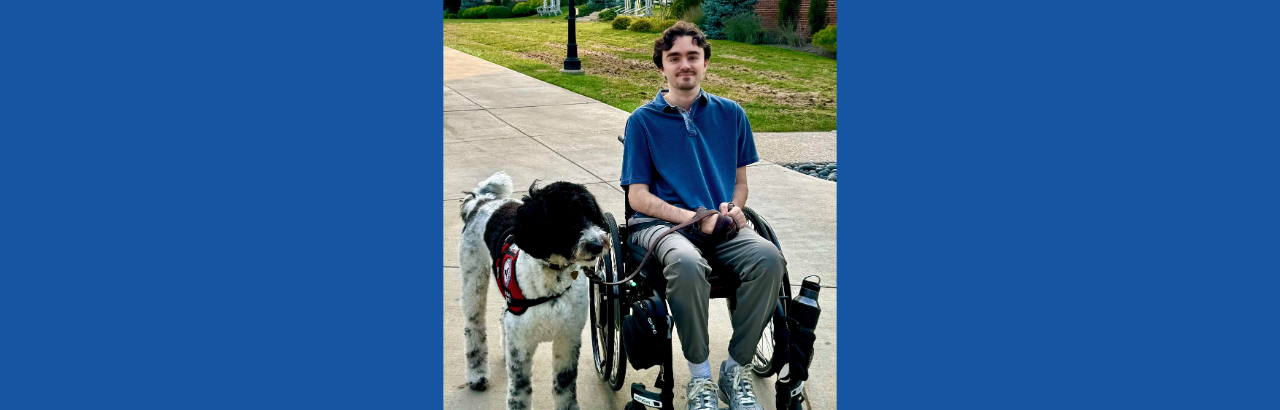 Steph with his service dog, Noel