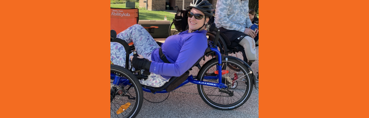 Molly riding a recumbent bike
