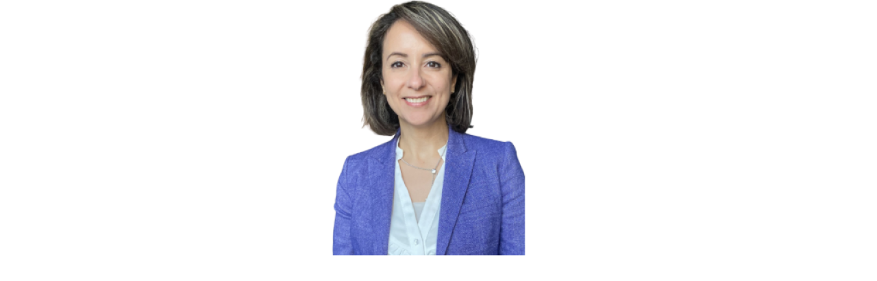 Photo of Sara Ahmed, a young white woman with short brown hair wearing a blue blazer