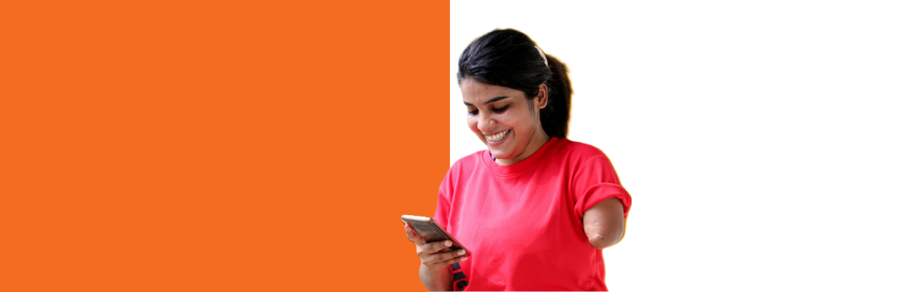 Woman with left arm amputation above the elbow looking at smartphone in right hand