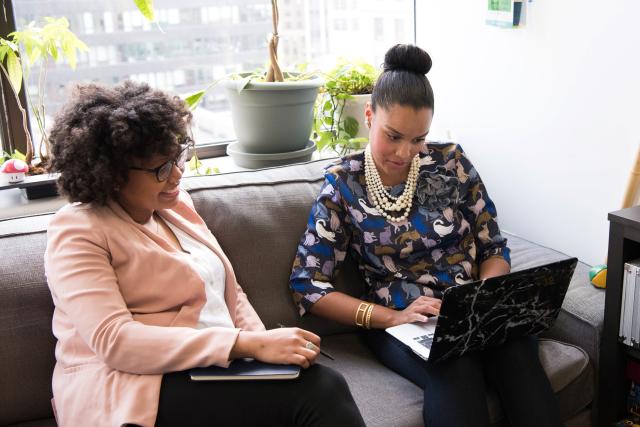 Two women on a computer