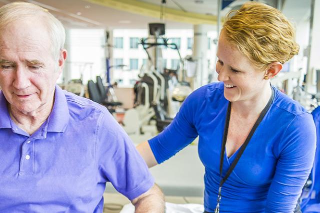 A Parkinson's patient works with their clinician