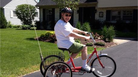 Walter Mason on a bike as he rejoins his community after stroke