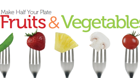 fruits and vegetables on forks