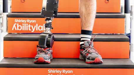 Man standing with powered leg
