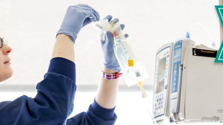 Nurse working with I.V.