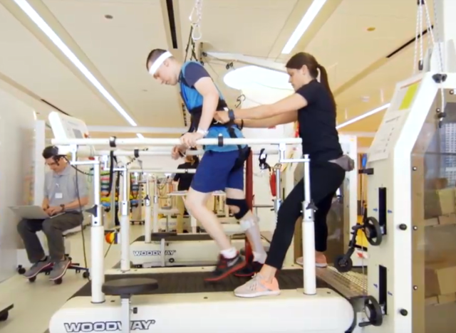 Ryan walking on a treadmill after his stroke
