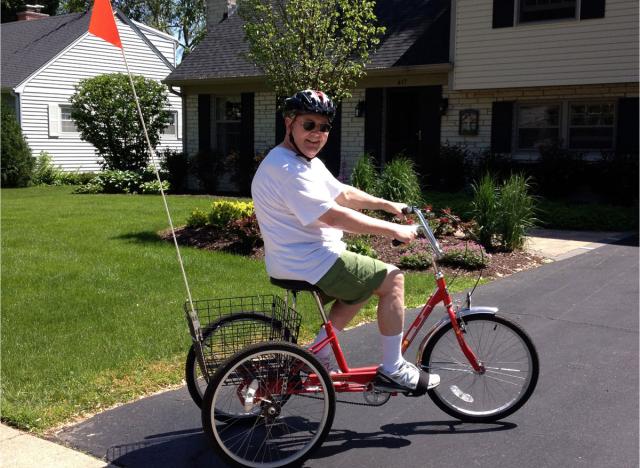 Walter Mason on a bike as he rejoins his community after stroke