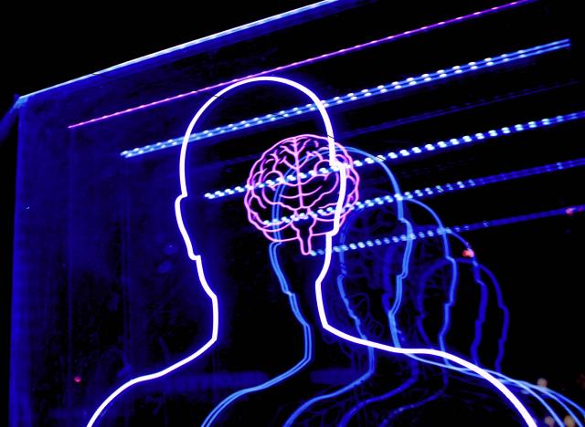 Neon silhouette of man w/ brain, repeating